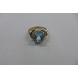 A 9ct gold aquamarine and diamond ring, size K, approx 3 grams, in good condition, some usage marks