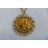 A 1915 George V full gold sovereign, with yellow metal mount and chain, approx 19 grams overall