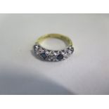 An 18ct yellow gold diamond and sapphire ring, size K, approx 3.7 grams, some usage marks but