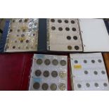 Five albums of assorted world and British coins