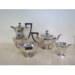 A silver Walker and Hall four piece tea set, Sheffield 1925/26 water jug, 1927/28 - total weight ,