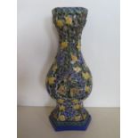 An oriental reticulated vase, 32cm tall, missing its handles and with small chips otherwise