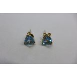 A pair of 9ct gold and aquamarine earrings, approx 1.1 grams, in good condition