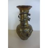An Oriental bronze dragon vase, with character marks to base - 25cm tall, no obvious damage or