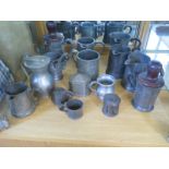 Fifteen pieces of pewter jugs and other items, condition consistent with age and usage, some dents