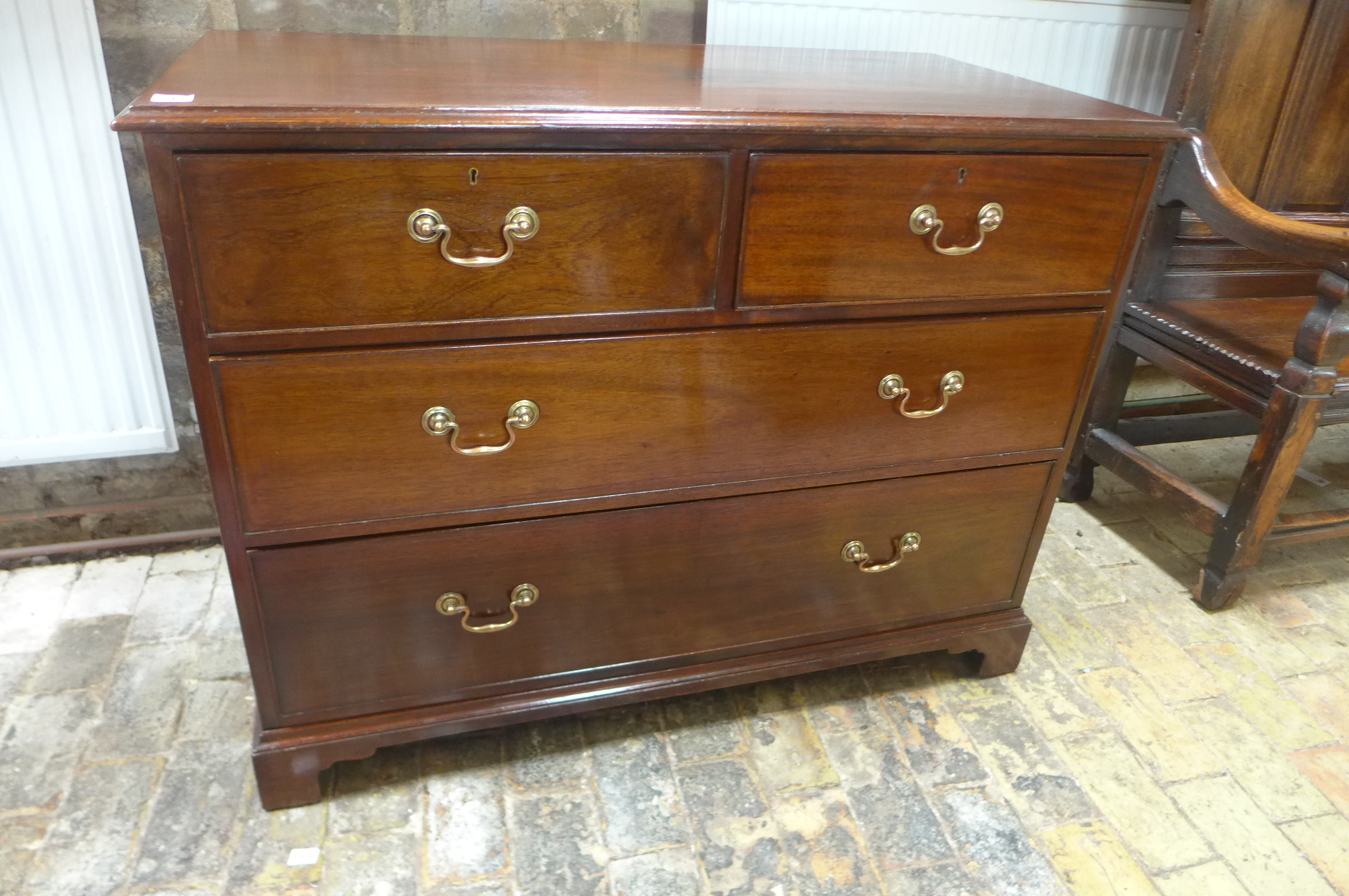 A mahogany Georgian style four drawer chest, 84cm tall, 110cm x 55cm