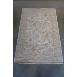 A Laura Ashley Home cotton rug, 117cm x 160cm - some stains