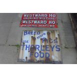 Two Westward Ho enamel signs, 92x23 cm - and a Breed more pigs Thorleys Food sign - both with