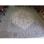 A hand knotted woollen kashan rug - 342cm x 250cm