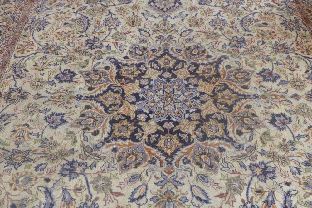A hand knotted woollen rug with a cream field and foliate design 410cm x 290cm - Image 2 of 4