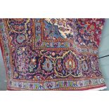 A hand knotted woollen Kshan rug - 224cm x 145cm