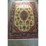 A hand knotted woollen Esphihan rug - 210cm x 131cm