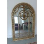 A large gilt and silver decorated mirror - 180cm tall x 121cm