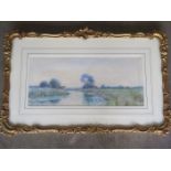 A framed and glazed watercolour by local listed artist R W Frazer - at West Row Suffolk, bares