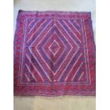 A hand knotted woollen Gazak rug - approx 129cm x 120cm - in good condition