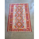 A hand knotted vegetable dye wool Chobi Kelim rug - approx 121cm x 84cm - in good condition