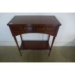 A small mahogany two drawer hall table - 76cm tall x 66cm x 32cm