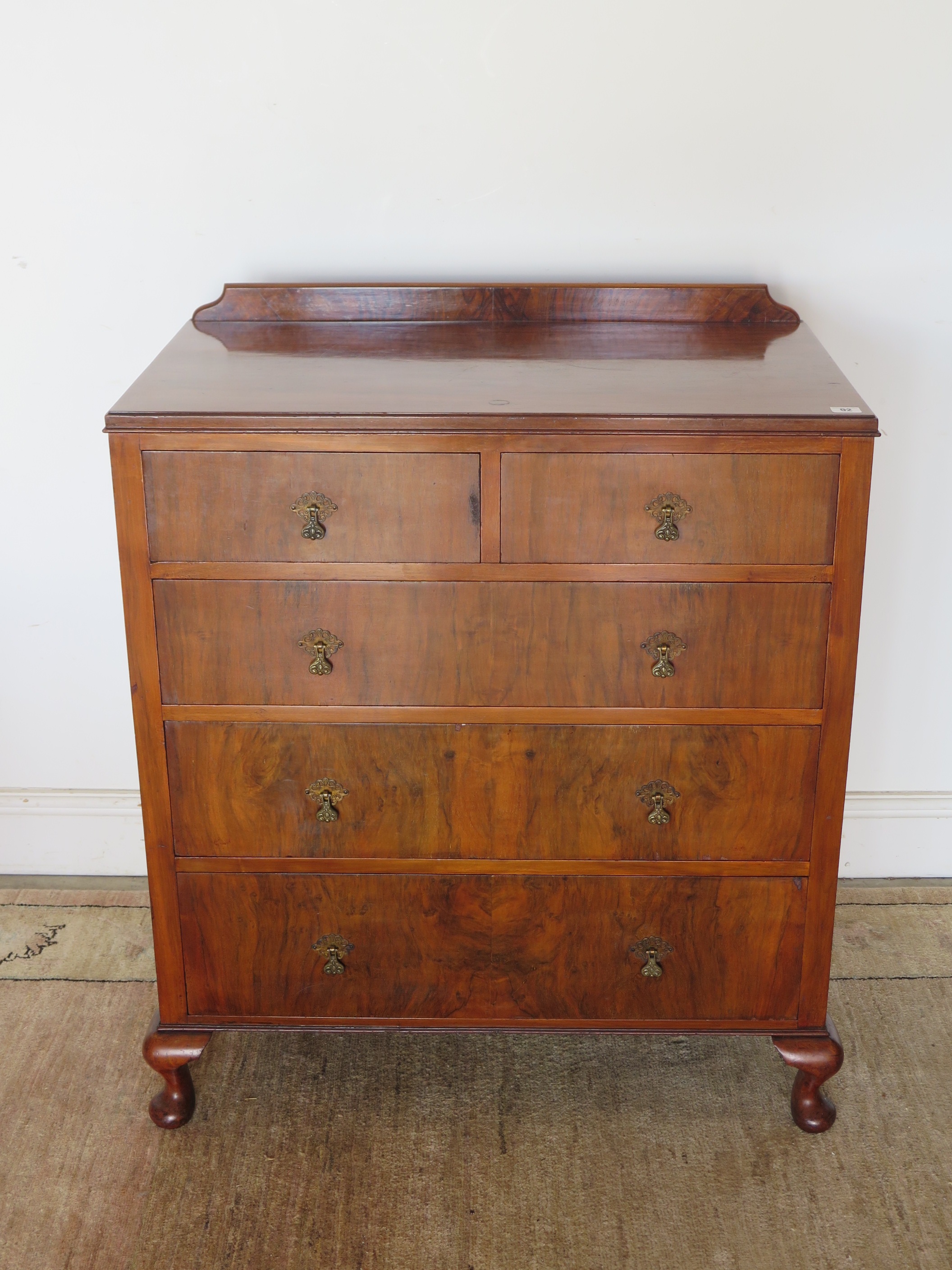 A circa 1930s walnut chest of two over three drawers, approx 82.5cm W x 97cm h x 50cm D - in good