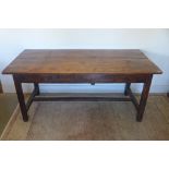 An 18th century and later continental fruit wood kitchen table with two drawers, 79cm tall, 176cm