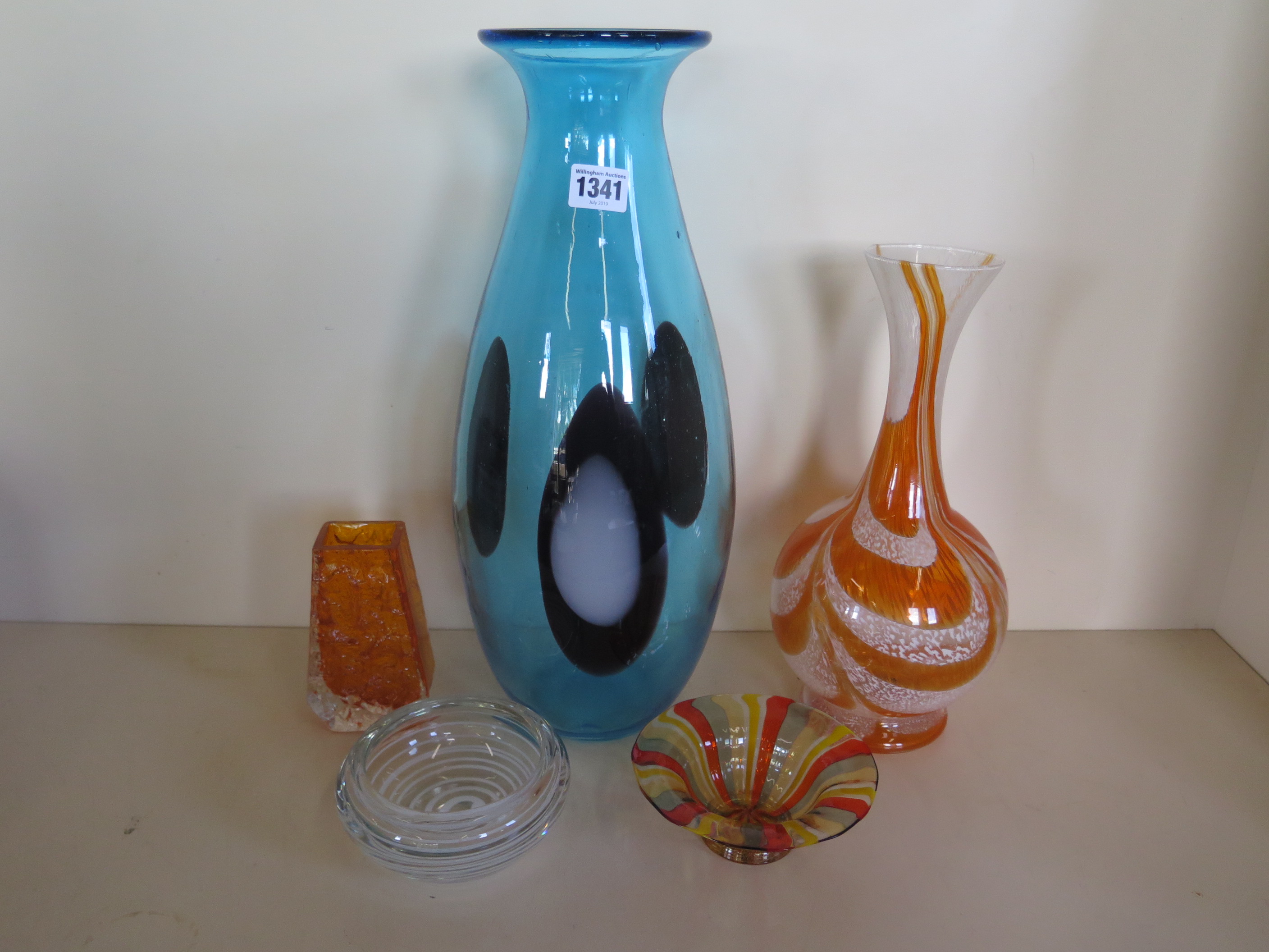 A large 1960s blue glass vase together with two others and two bowls, height of the tallest is