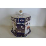 A Victorian Imari palette ceramic cheese bell and stand, some wear but generally good