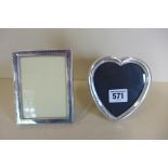 A pair of silver photo frames, largest 13x10cm