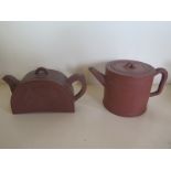 Two Chinese red ware teapots, both decorated with Chinese script, tallest approx 10cm, some small