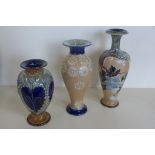 Three 19th century Royal Doulton stoneware vases of different designs, largest approx 26cm high,