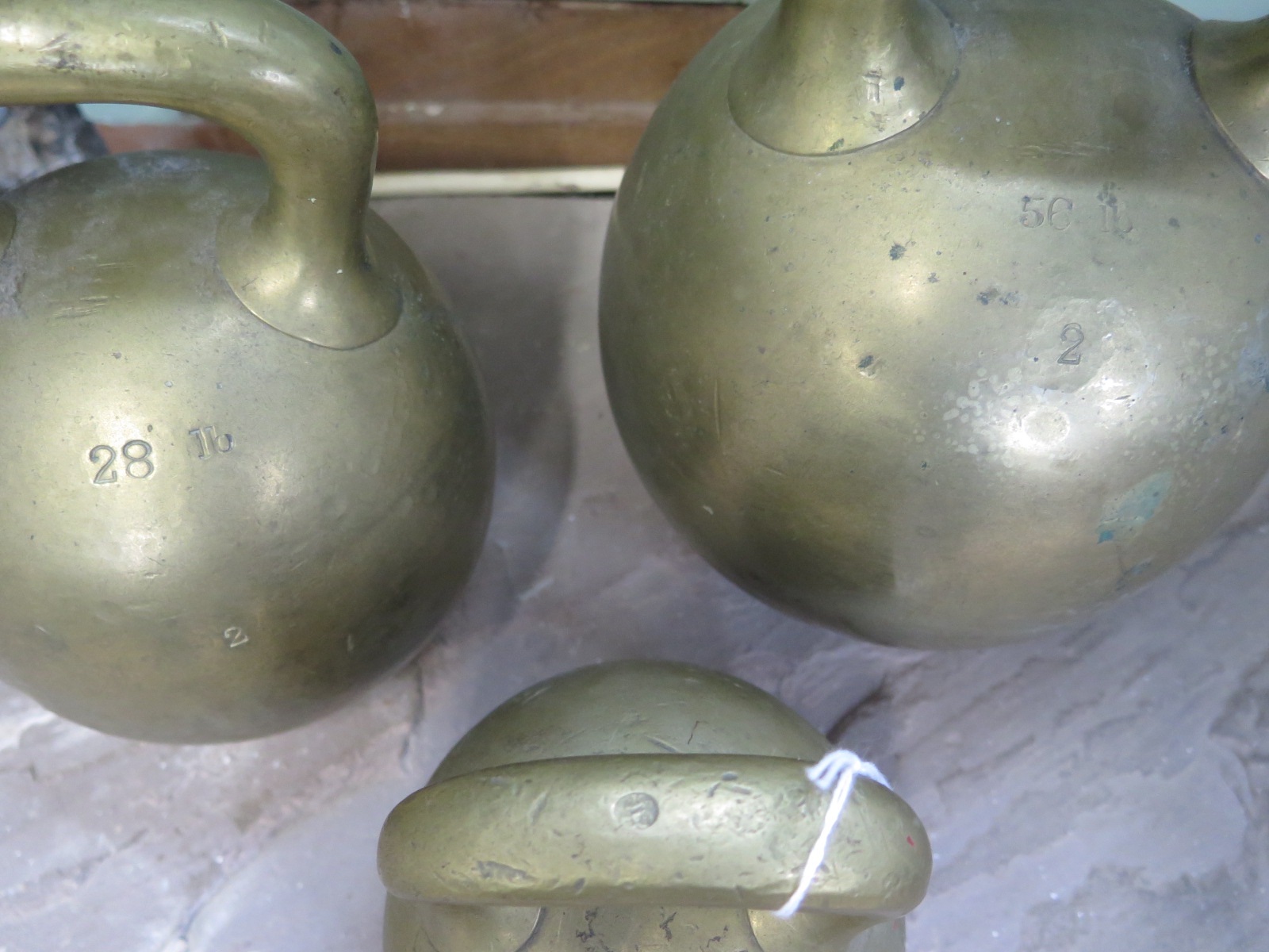 Three 19th Century brass imperial ball weights, with single loop handles, 56lb , 28 lb and 14lb - Image 3 of 3