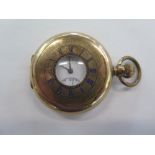 A gold plated half hunter pocket watch by Limit, currently running in the saleroom, plating worn