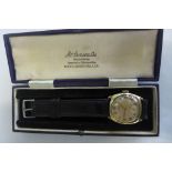 A 9ct gold Benson gents manual wind wristwatch with original box, 32mm wide, including button,