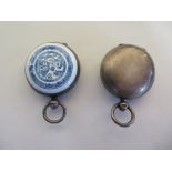 Two silver sovereign cases, one with enamel decoration, some small wear, minor chips to enamel