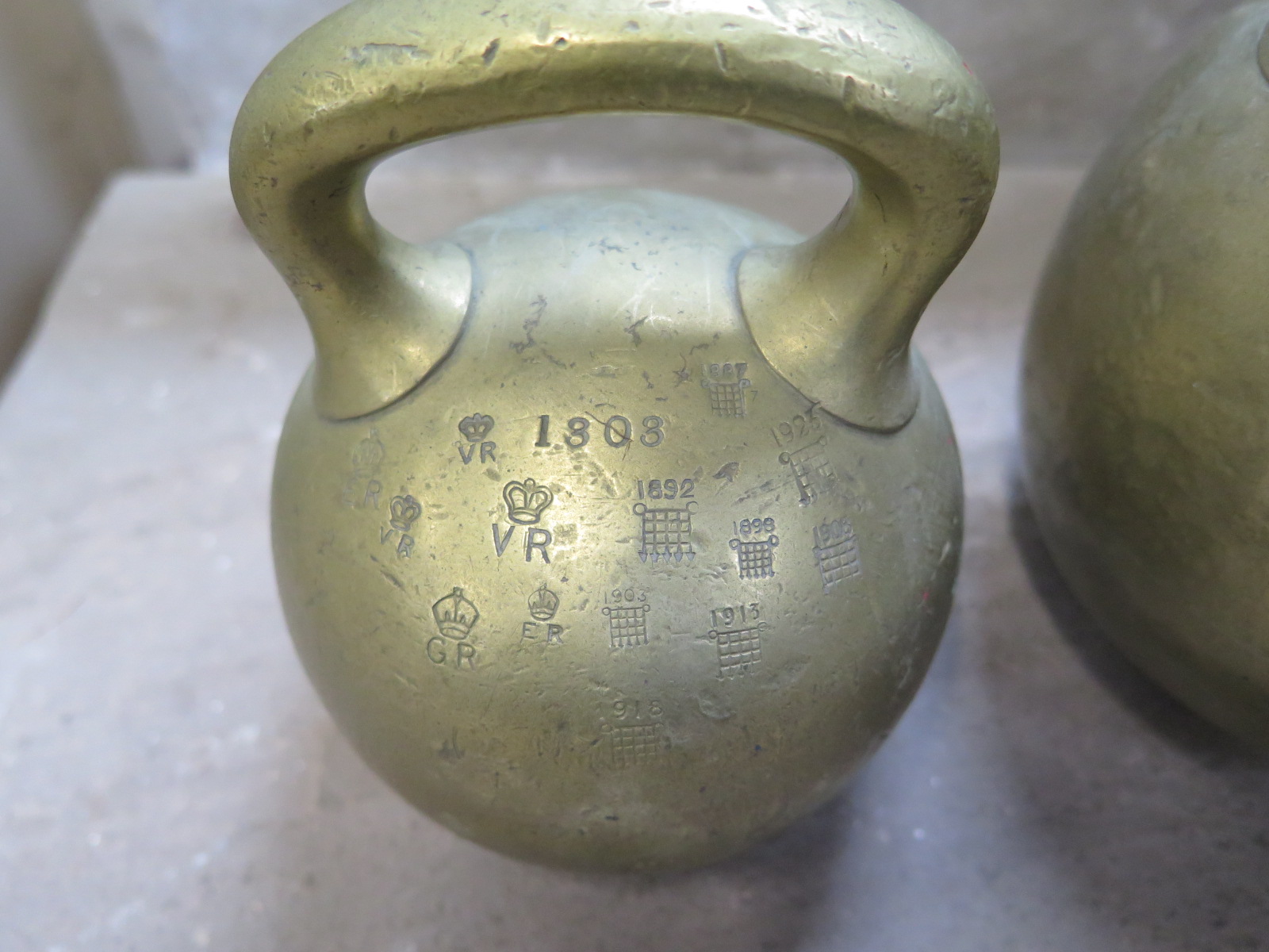 Three 19th Century brass imperial ball weights, with single loop handles, 56lb , 28 lb and 14lb - Image 2 of 3