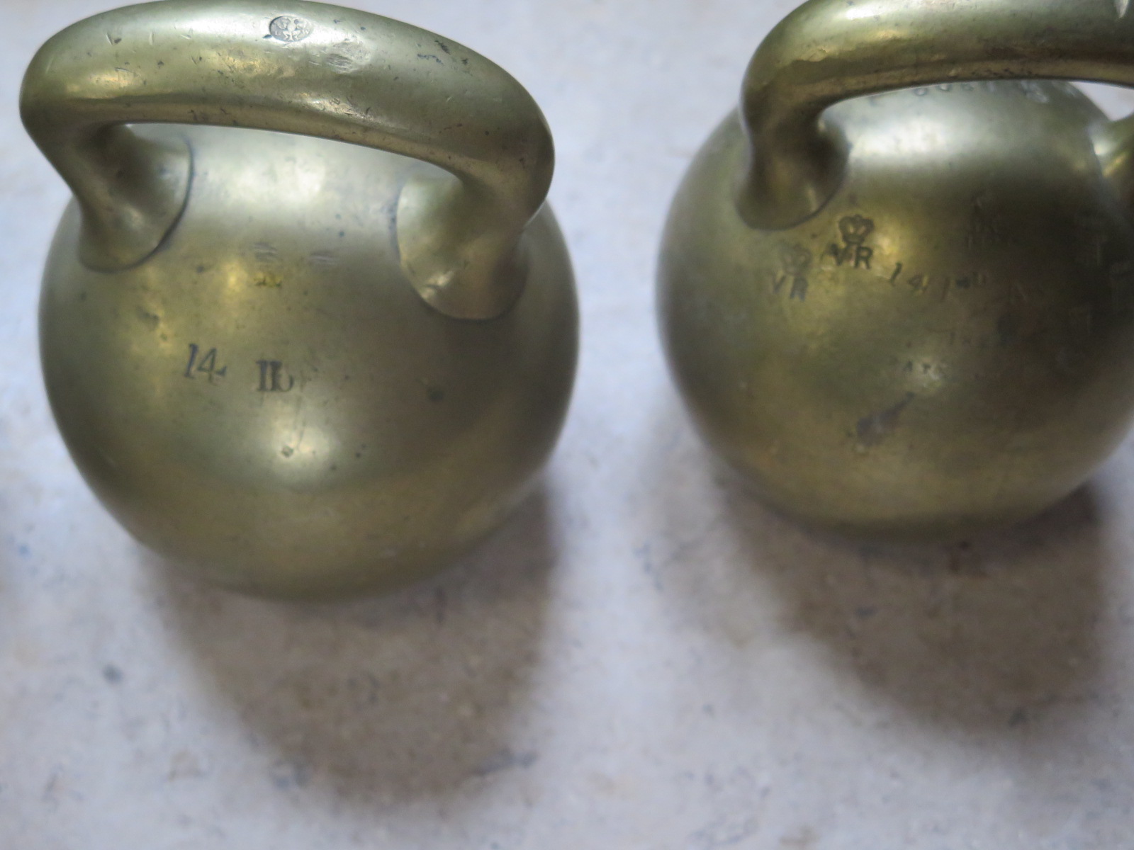 Four brass imperial ball weights, each with single loop handles, three Georgian, with 56lb , 28lb - Image 3 of 3