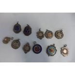 A collection of eleven silver fobs including RAF cycling association - approx 3.3 troy oz