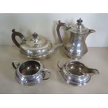 A silver tea service with teapot and milk jug, Birmingham 1926, teapot, Birmingham 1927 and a