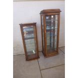 Two tall thin wall display cabinets, 88cm tall x 33cm x 20cm and 71cm x 29cm x 17cm - internal