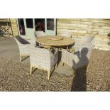 A Bramblecrest aluminium circular table with rattan armchairs, ex-display