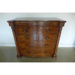 A Victorian mahogany bow fronted chest with a cushion drawer above two small and three long drawers,