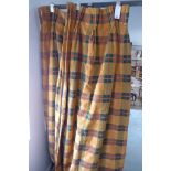 A pair of Zoffany gold plaid lined 56 inch wide x 102 inch drop curtains