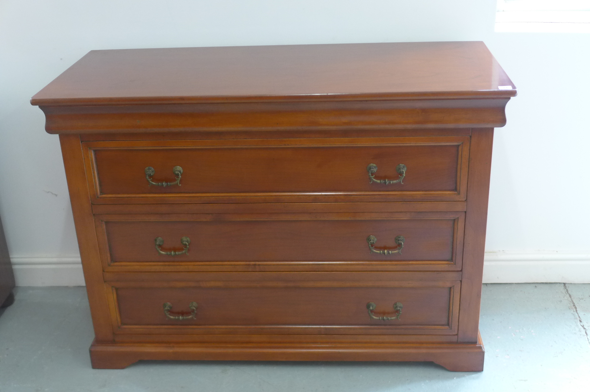 A 20th century cherry wood three drawer chest, 89cm tall x 125cm x 54cm - by Consorzio Mobili