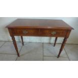 A Victorian style two drawer hall table on turned legs, made by a local craftsman to a high standard