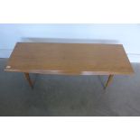 A Gordon Russell coffee table - 40cm tall x 121cm x 43cm