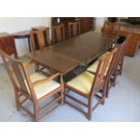 An oak refectory style maple quality draw leaf dining table, with eight chairs by Lindfield Luff and