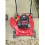 A petrol lawn mower with a Briggs and Stratton engine, rough cutter, in working order