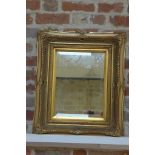 A modern gilt framed mirror, 64x54cm