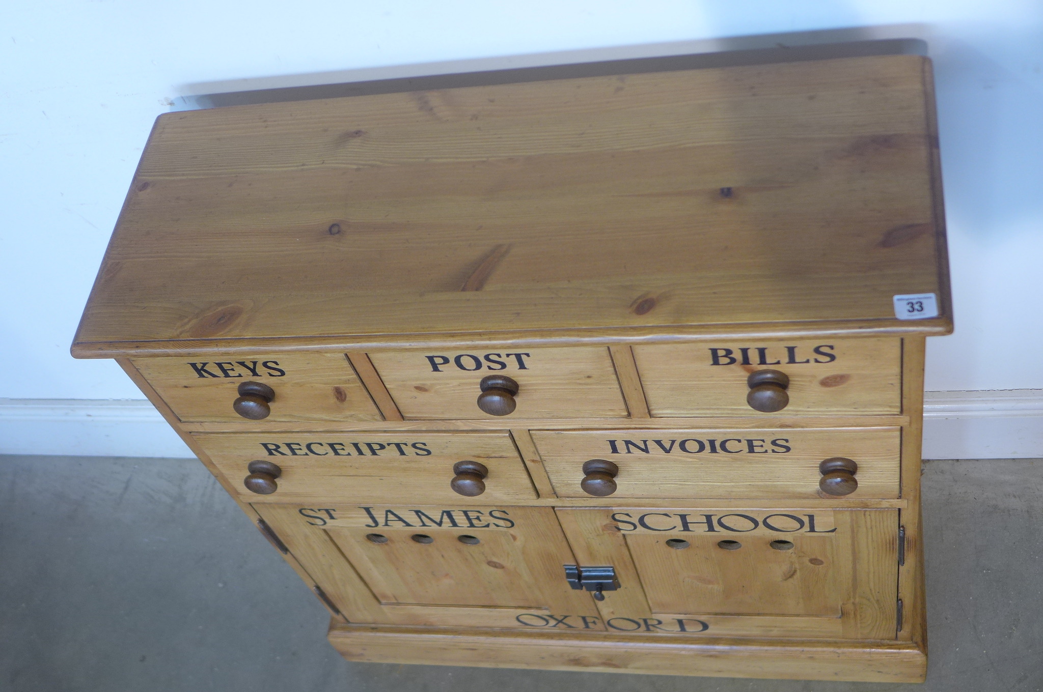 A pine storage chest with three drawers and two cupboard doors, 81cm tall x 77cm x 30cm - Image 2 of 3