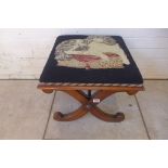 A 19th century mahogany X frame stool with needlepoint seat - 40cm tall x 44cm x 44cm