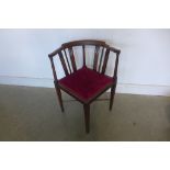 A Edwardian and mahogany corner chair