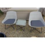 A pair of Bramblecrest side chairs and a side table